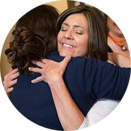 Women Hugging at Sweet Life Cafe Women's Ministry Retreat