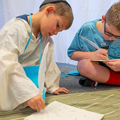 Kids coloring at Jerusalem Marketplace