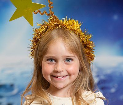 Girl dressed up as an angel for Twinkle, Twinkle