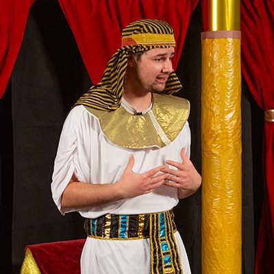 VBS volunteer dressed like Joseph in Egyptian clothes