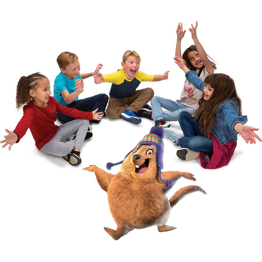 Kids in a circle cheering with a Bible Buddy