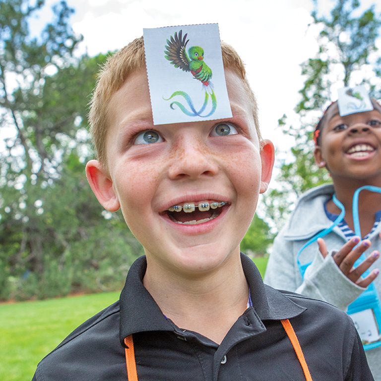 VBS boy with buddy character on his forehead