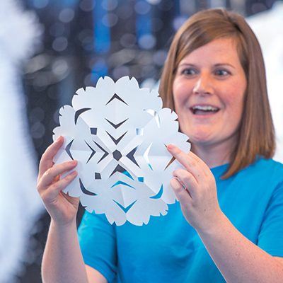 VBS leader with a cut-out snowflake