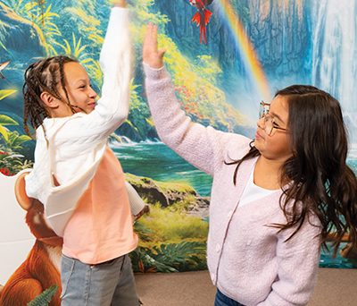 Kids high fiving